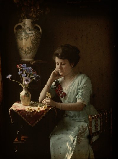 Kvinde med blomster af Johannes Hendrikus Antonius Maria Lutz