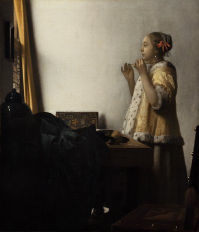 Ung dame med perlehalskæde af Johannes Vermeer