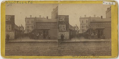 Udsigt over John R. Walsh Periodicals-butik på Madison Street, Chicago med postkontoret i baggrunden, 1869 af John Carbutt