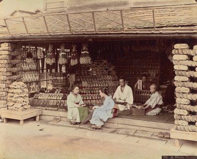En skobutik af Kusakabe Kimbei