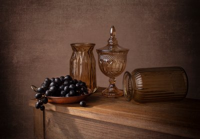 Druer i ravfarvet glas af Margareth Perfoncio