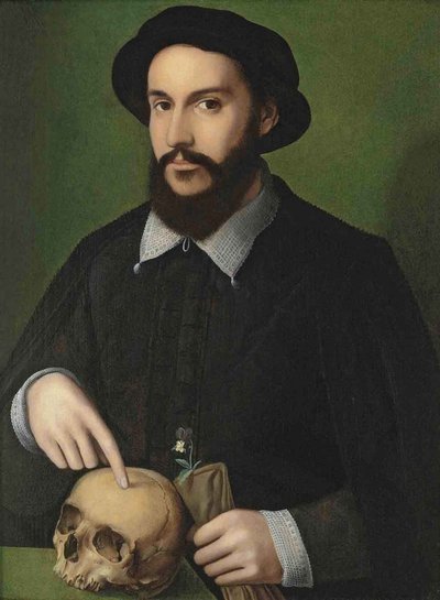 Portræt af en mand, der peger på et kranium af Master of the 1540s