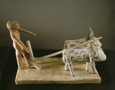 Begravelsesmodel af en plovmand, der leder sin plov tegnet af to okser (malet træ) af Middle Kingdom Egyptian