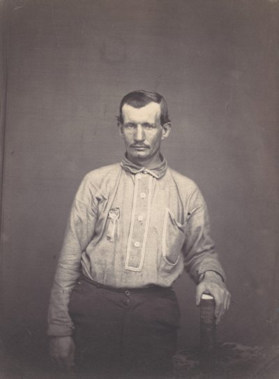 Mand med patentkontorbog, ca. 1857. af Oliver H. Willard.