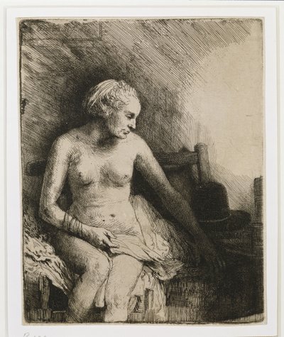 En kvinde ved badet med en hat ved siden af sig, 1658 af Rembrandt van Rijn