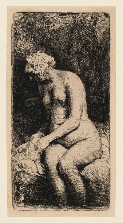 Kvinde bader sine fødder ved en bæk af Rembrandt van Rijn