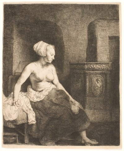 Kvinde sidder halvt påklædt ved siden af et komfur af Rembrandt van Rijn