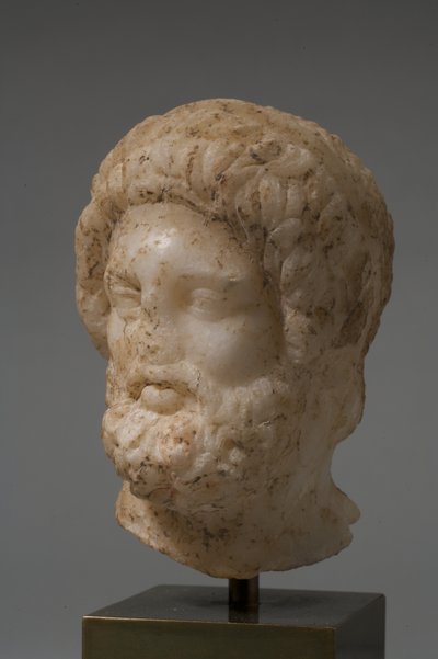 Hoved af en gud (marmor) af Roman