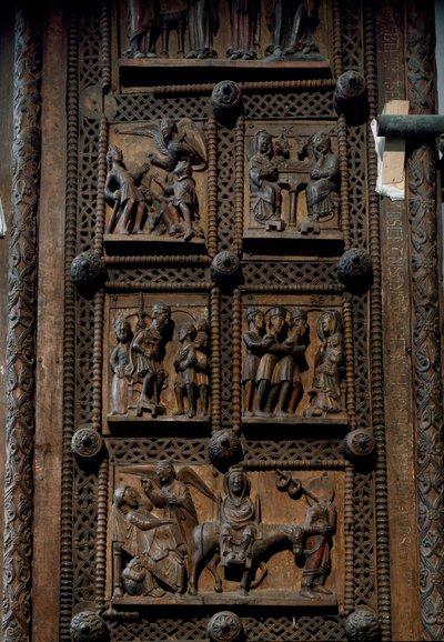Romansk kunst: trædør fra midten af det 12. århundrede til kirken St. Mary of the Capitol i Köln, Tyskland (Sankt Maria im Kapitol, Köln). Scener, der skildrer annonceringen til hyrderne, fødselaren, magikernes tilbedelse og af Romanesque