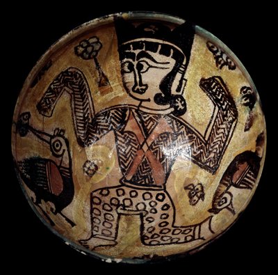 Persisk kunst: terracotta kop med en karakter med to fluer. Privat samling af School Persian