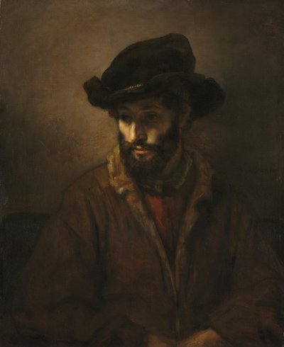 En skægget mand iført hat af Studio of Rembrandt van Rijn
