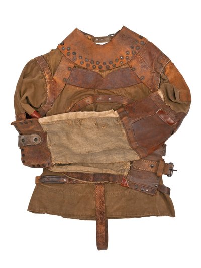 Spændetrøje ejet af Harry Houdini, ca. 1915 (khaki kanvas, læder og metalnitter) af Swanfeldt Tent and Awning Co.