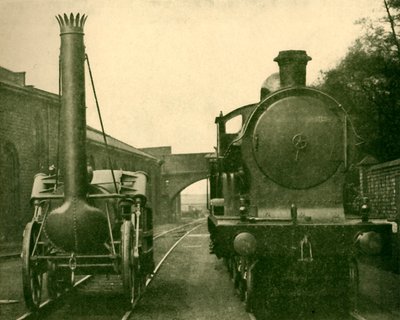 En model af Stephensons Rocket i fuld størrelse sammen med en motor fra George the Fifth Class, Londo af Unbekannt