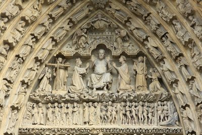 Tympanum på portalen til den sidste dom: dommens Kristus. Ved hans side, på hans knæ, går Jomfru Maria og Sankt Johannes i forbøn for sjælenes frelse. Amiens-katedralen, Amiens, Frankrig af Unbekannt