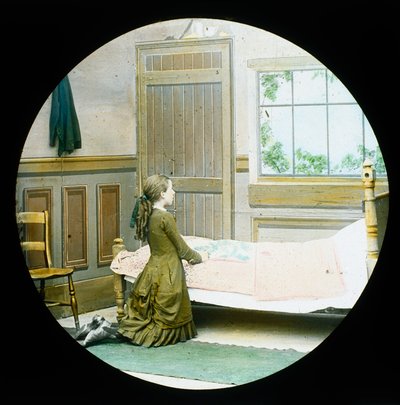 En pige, der knæler i bøn ved sin seng, magisk lanternerutsjebane, c 1890 af Unbekannt