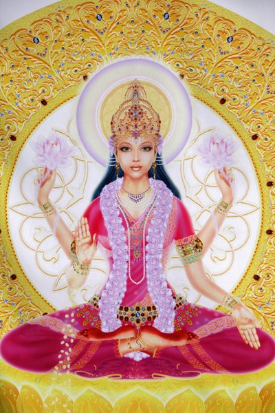 Billede, der viser Lakshmi, rigdommens gudinde og konsort af Lord Vishnu, der sidder og holder lotusblomster af Unbekannt