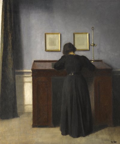 Ida står ved et skrivebord, 1900 af Vilhelm Hammershoi