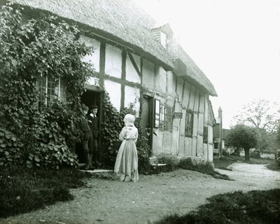 "Folk ved en hyttedør" (Mennesker ved en hyttedør) af Frederick (attr. to) Barnard