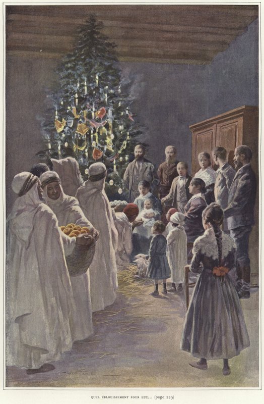 En familiegruppe, der ser en julekrybbe ved et juletræ af French School