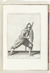 Skjold- og spidsøvelsen: Soldaten i forsvarsposition med den ene fod foran og hans griber og skjold på knæet foran kroppen (nr. 21), 1618 The Nassausche Wapen-Handinge, van Schilt, Spies, Rappier andde Targe : beyde figuerli