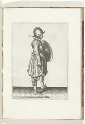 Skjold- og piggeøvelsen: Soldaten med skjoldet klar og piggen på jorden ved siden af ​​sin højre fod (nr. 17), 1618 Nassausche Wapen-Handelinge, van Schilt, Spies, Rappier and the Targe: beyde figuerlick afbildet, ende indrammet efter den nye