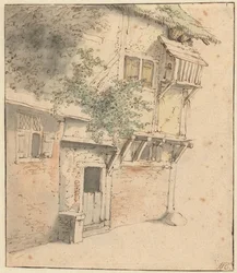 Facade af et tilgroet hus