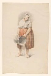 Stående kvinde tømmer en spand