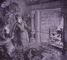 En familie brænder julegrønt og laver toast