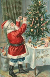 Julemanden pynter et juletræ