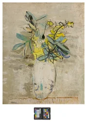 Grene med blomster i en vase