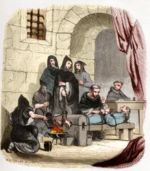 Inkvisitionen i Spanien i det 15. århundrede: Maria af Burgund (1457-1482), anklaget for at være jøde, tortureres af den hellige Peter (Pedro) af Arbues (1441/1442-1485), spansk inkvisitor: han brænder hendes fødder. Illustration i «Inkvisitionens