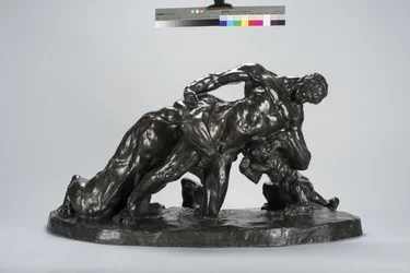 Mand låst i kamp med Lioness Cub (bronze)
