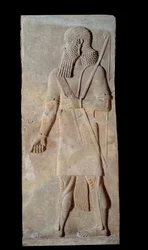 Art Mesopotamia (Assyrien): Kriger i våben fra hoffet til paladset til kongen af Assyrien Sargon II (721 - 705 f.Kr.). Paris, Musée du Louvre