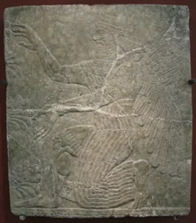 Bevinget guddom ved det hellige træ. Relief fra paladset Ashurnasirpal II i Kalhu, Nimrud, 9. århundrede f.Kr.