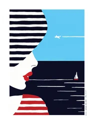 Kvinde, der betragter havet
