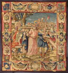 Kristus og Simon af Kyrene (Kyreneeren). (Femte stop på korsvejen (bærer korset). Et stykke af korset bærer inskriptionen I.N.R.I. (INRI). Gobelin fremstillet i manufakturerne i Bruxelles. 16. århundrede Genes, Musei di Strada Nuova