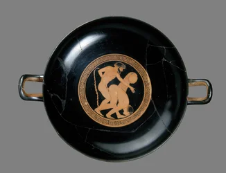 Rødfigur kylix, der forestiller en mand og kvinde, der elsker (keramik)