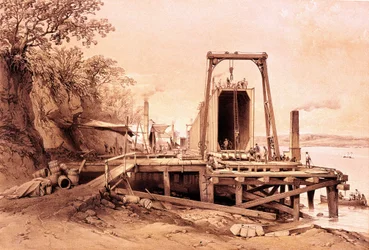 Industriel revolution: installation af en præfabrikeret bro. Gravering fra "Britannia and Conway Tubular Bridges""