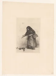 Kvinde fodrer fugle