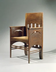 Lænestol, designet i 1897 (eg med hastesæde)