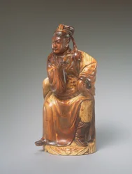 En figur af Guandi siddende, 14.-15. århundrede (udskåret elfenben)