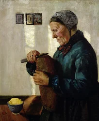 Kvinde skærer brød
