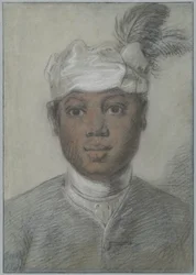 Hoved af en ung sort mand med fjerprydet turban