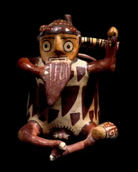 Før colombiansk kunst, Nazca-civilisation: antropomorf vase, der repræsenterer en musiker, der spiller panfløjte. 100 f.Kr.-800 e.Kr. Lima, arkæologisk museum