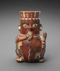 Figurkrukke med Pan Pipe og kølle, ca. 600-1000 AD (lertøj med slip)