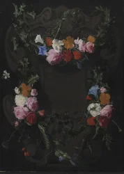 En stenkartouche med en blomsterkrans
