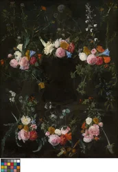 Skulpteret kartouche prydet med blomsterkranse