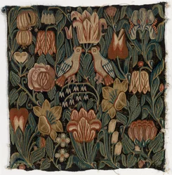 Pudebetræk af gobelin, der forestiller to fugle midt i blomster, lavet i Schleswig-Holstein, Danmark, ca. 1690 (uld)