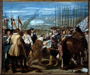 Bredas overgivelse. Ved afslutningen af belejringen af Breda (under Trediveårskrigen): den 5. juni 1625 forhandlede Justin de Nassau (1559-1631) fred med Ambrogio Spinola Doria, Marquis de Los Balbases (1569-1630), under en ceremoni hvor han afleverede k