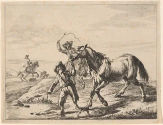 En dreng, der tager en hest at drikke